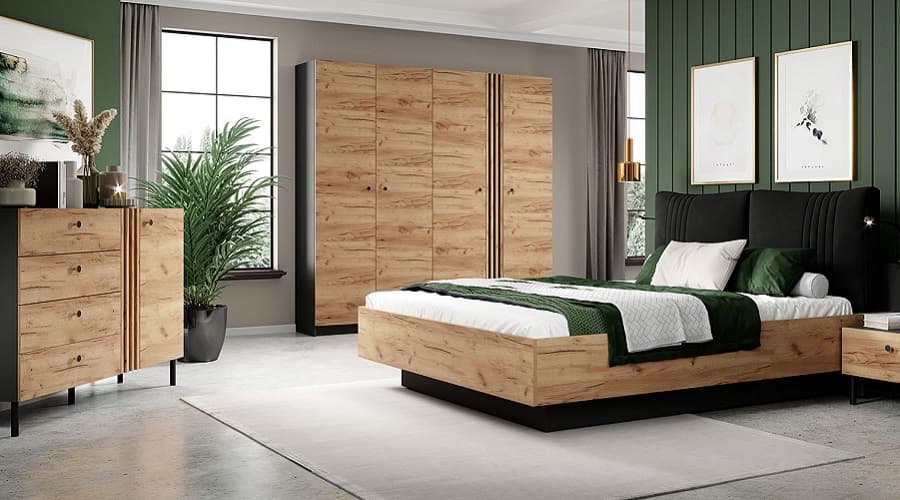 Wardrobe and bed assembly in a bedroom